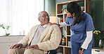Conversation, nurse and senior man in wheelchair at retirement home for medical support. Comfort, happy and elderly male person with disability in house for healthcare consultation with caregiver.