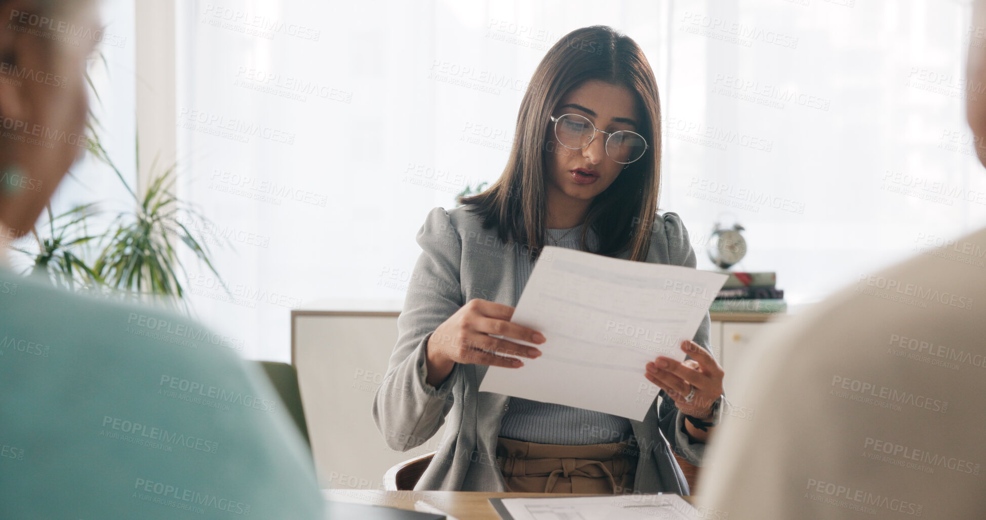 Buy stock photo Businesswoman, talk and document in consultation with people, advice or risk assessment for insurance. Person, client and paperwork in office with meeting, review finance and report for policy claim.