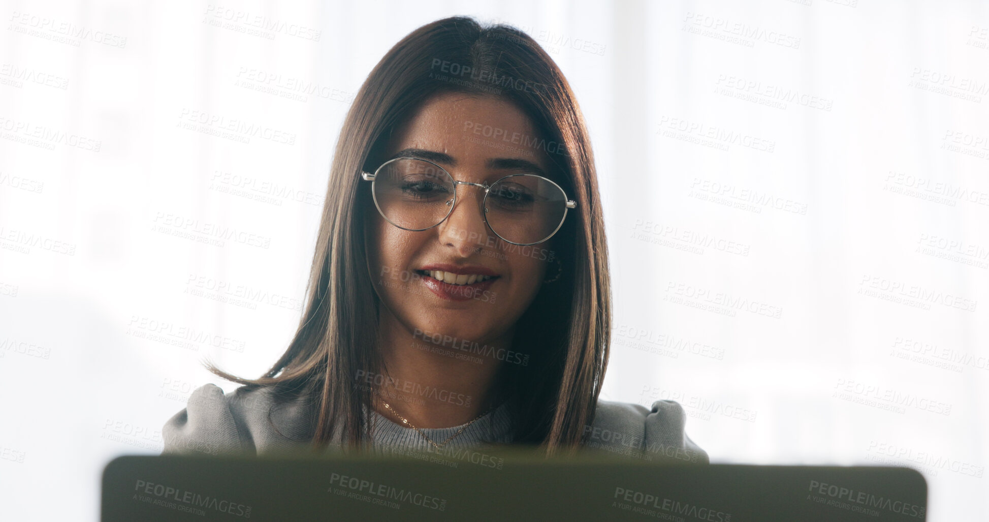 Buy stock photo Happy, businesswoman and reading in office with laptop, paralegal admin or good news for court case. Law clerk, smile and person in firm with computer, dispute resolution or review lawsuit settlement