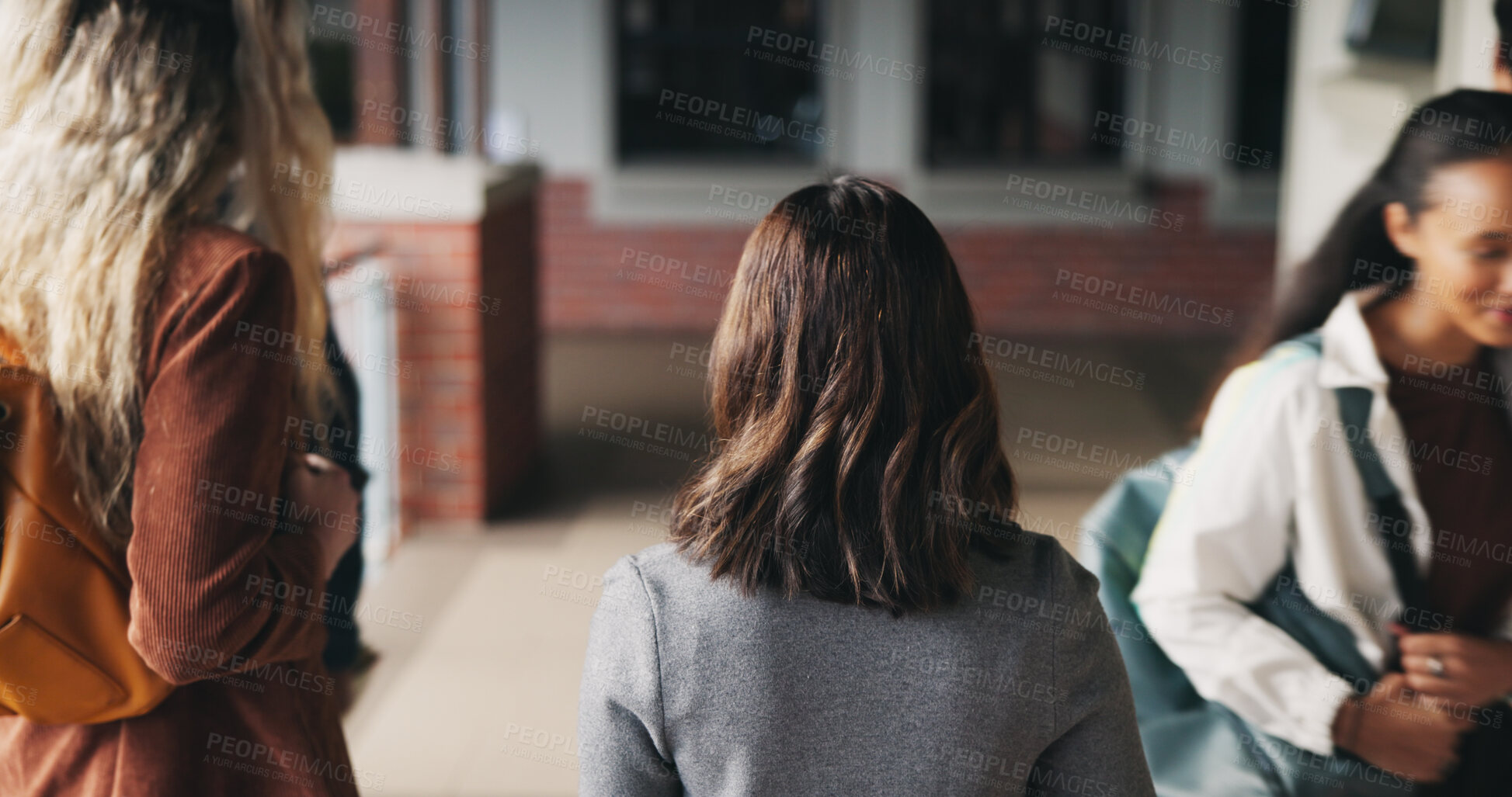 Buy stock photo Friends, education and women at hallway in college, back and walking to class for development. University, students and people in corridor for campus arrival, scholarship or academic future at school