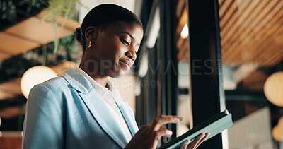 Buy stock photo Creative, research and woman with tablet in cafe, publicist or checking campaign on social media app. Low angle, scroll and black person with tech for pr project, remote work and reading info in shop