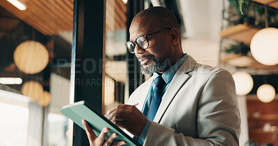 Buy stock photo Businessman, glasses and research with tablet in cafe, private wealth attorney and will draft on web. Black person, estate planning and mature lawyer with tech for project or remote work in office