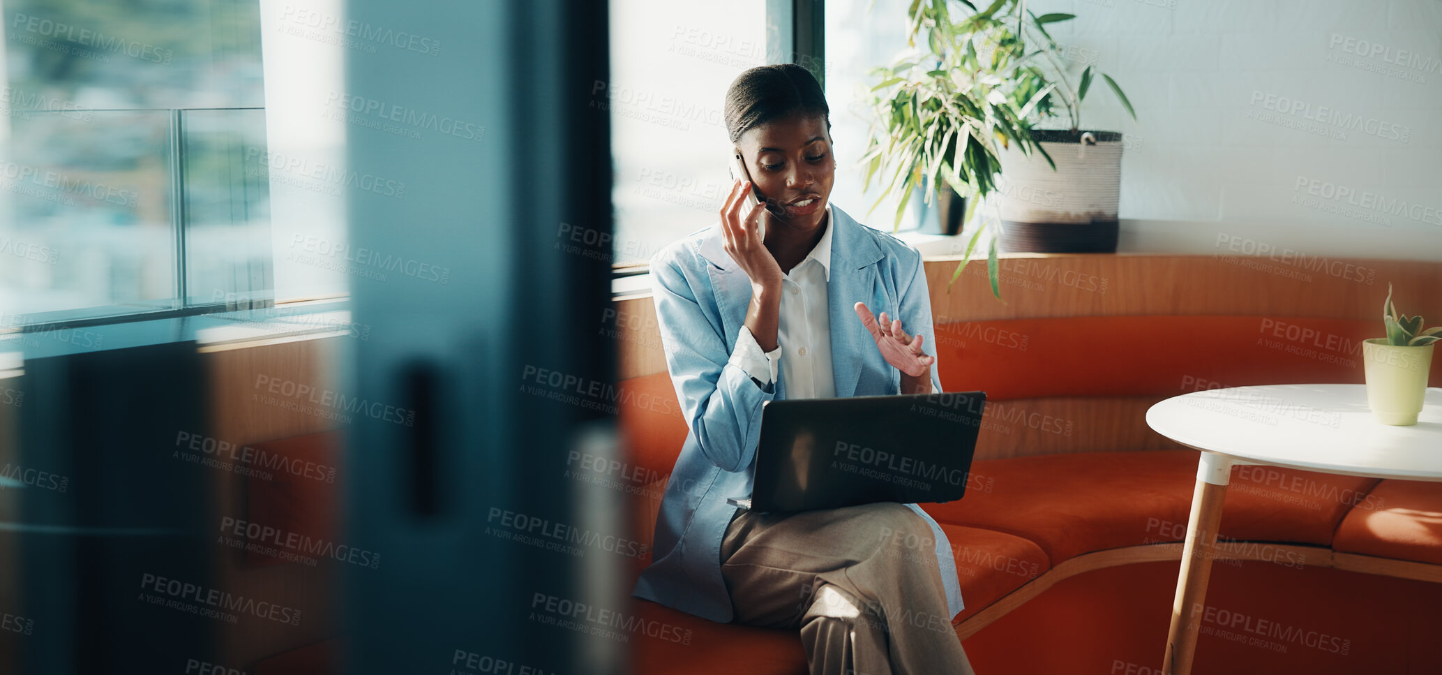 Buy stock photo Laptop, office and black woman with phone call for communication, copywriting or opportunity. Discussion, advice and editor talking on mobile, contact or support for online editing in startup agency