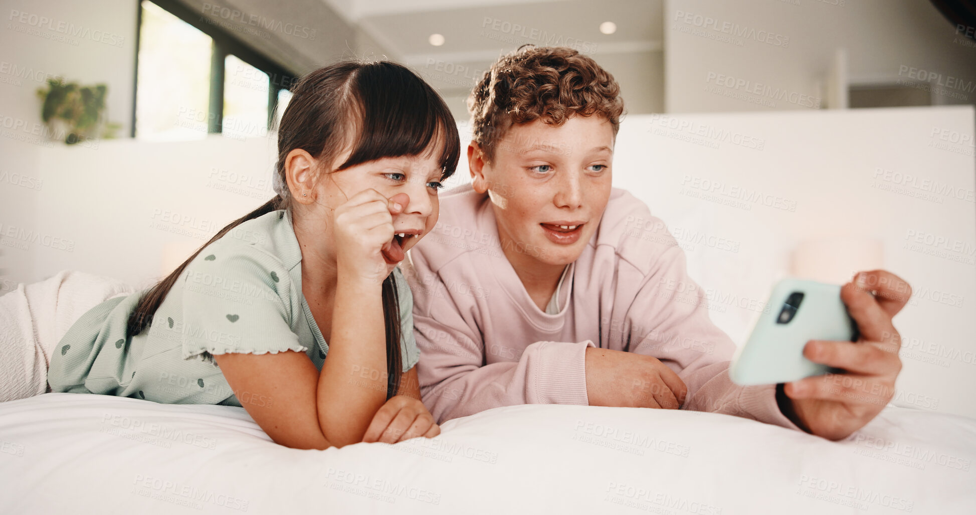 Buy stock photo Selfie, boy and girl with tongue out in bedroom, social media post and memory of siblings bonding. Photography, smile or children with morning picture for web update, funny face or connection in home