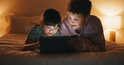 Buy stock photo Night, relax and kids with tablet in bedroom for game, streaming cartoon or watch show on internet. Tech, siblings and children on bed at home for movie, subscription service and entertainment