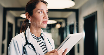 Buy stock photo Medical, tablet and doctor thinking in hospital for planning, problem solving or telehealth solution. Tech, clinic and professional woman with research, evaluation or idea for treatment in hallway