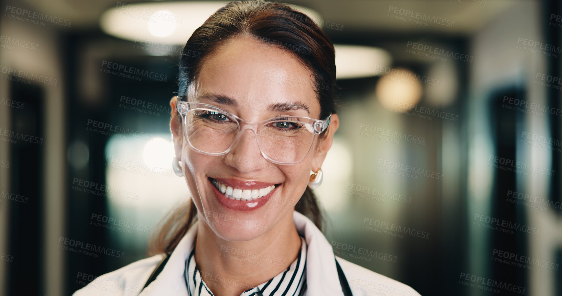 Buy stock photo Woman, doctor and portrait with pride in hospital hallway for medical assistance, advice or help. Female person, healthcare worker or smile with glasses for health service or wellness in corridor