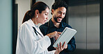 Medical, doctor and team with tablet, planning treatment or advice for insurance report in clinic. Tech, collaboration or happy people in hospital for meeting, healthcare discussion or review results