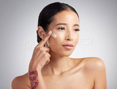 Buy stock photo Skincare, shine or woman in studio with cream, hydration benefits or facial care in spf lotion. Dermatology, glow or person with product, sunscreen protection or wellness routine on white background.