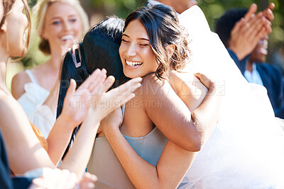 Buy stock photo Bride, hug and friends outdoor on wedding day for celebration at marriage ceremony or reception. Love, smile and thank you with women embracing at function for commitment, solidarity or unity
