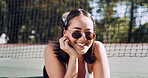 Sunglasses, fashion and portrait of woman outdoor on vacation, getaway or spring break with confidence. Happy, casual style and student by tennis net on holiday or weekend trip with trendy outfit.