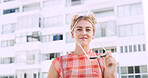 City, travel and woman with sunglasses for fashion, student or happy with scholarship for university. Commuting, portrait and person with college funding, space and smile with stylish shades in USA
