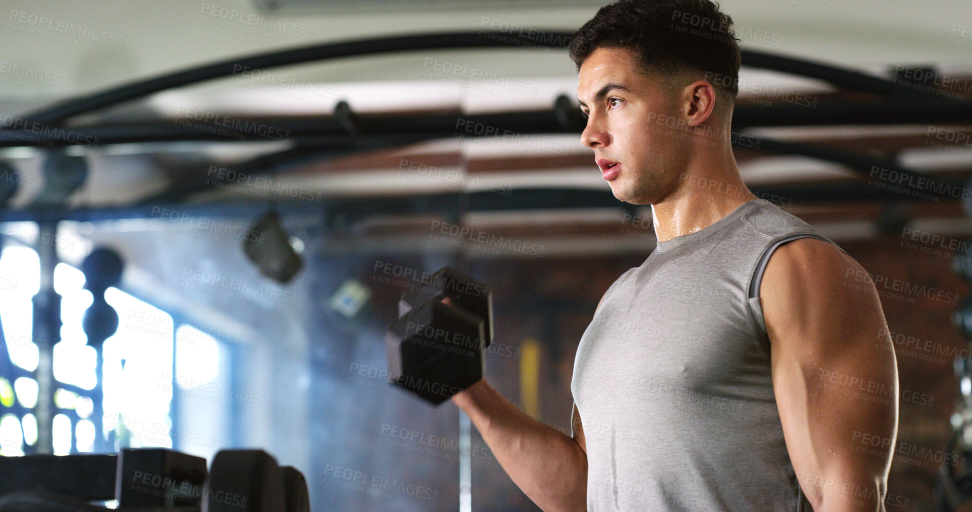 Buy stock photo Fitness, sweating or man with dumbbell in gym, strength challenge or routine for muscle development. Serious, bicep training or bodybuilder with weightlifting in sport club, active or intense workout