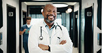 Portrait, man and doctor with arms crossed in hospital for diagnosis, medical advice and patient care. Smile, mature surgeon and confidence for assistance, healthcare services and cardiology expert
