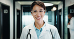 Happy, woman and doctor with portrait in hospital for diagnosis, medical advice and patient care. Smile, mature female surgeon and confident with experience, healthcare services and cardiology expert