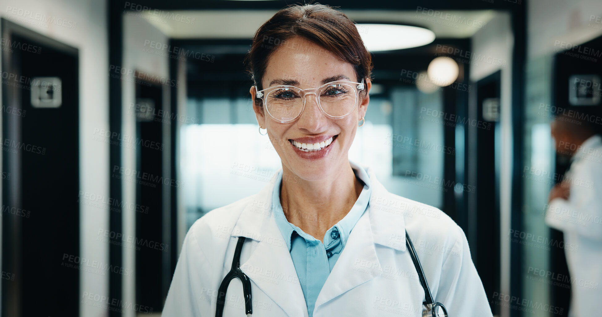Buy stock photo Happy, woman and doctor with portrait in hospital for diagnosis, medical advice and patient care. Smile, mature female surgeon and confident with experience, healthcare services and cardiology expert