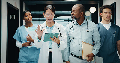 Buy stock photo Doctors, nurses and discussion in hospital with tablet, medical research and advice for patient care. People, teamwork and talk in clinic with tech, planning and collaboration for healthcare service.