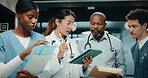 Doctors, nurses and talk in hospital with tablet, research or medical records for patient diagnosis. People, discussion and documents in clinic with tech, plan or collaboration for healthcare service