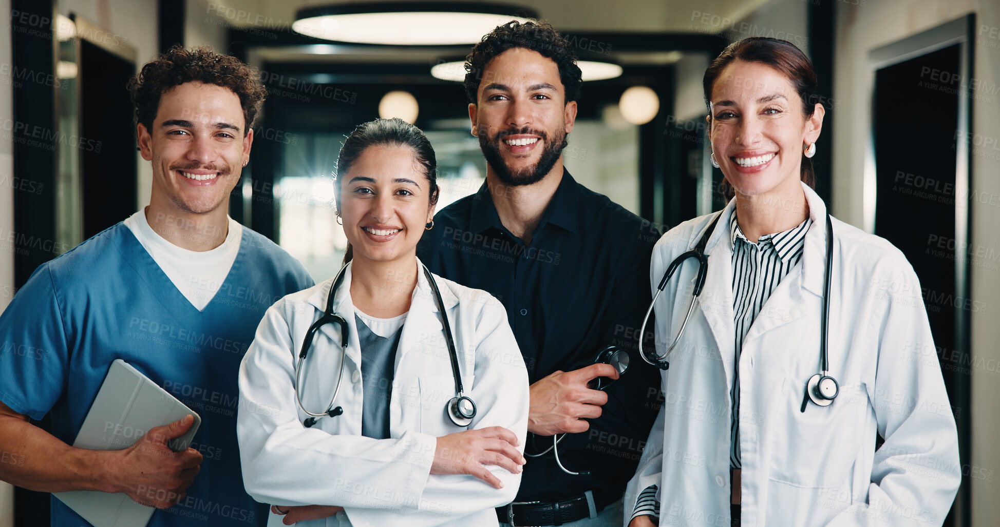 Buy stock photo Portrait, team and doctor with pride for healthcare, confidence and wellness career in hallway. Smile, physician or professional people with group for about us, management and arms crossed in clinic