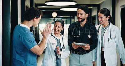 Buy stock photo Tablet, doctors and high five in clinic for discussion, report or collaboration success. Team, people and medical worker with digital tech for healthcare, schedule and celebration in hospital
