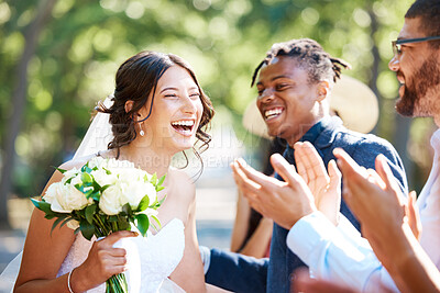 Buy stock photo Woman, guest and excited at wedding with applause, celebration and friends support in nature. Bride, laugh and people at venue with clapping, relationship milestone and congratulations with bouquet