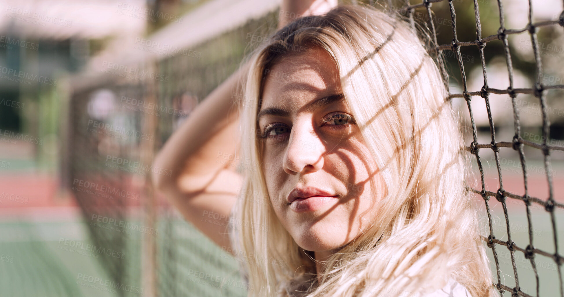 Buy stock photo Serious, relax and portrait of woman outdoor on spring break with confidence by fence in morning. Scholarship, gen z and female student by tennis net on weekend with calm  attitude and pride.