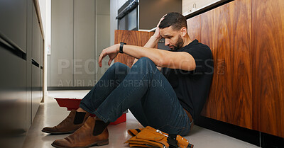 Buy stock photo Plumber, man and stress in kitchen with problem, repair challenge or thinking for maintenance crisis. Tired, person or handyman in home with plumbing mistake, contemplation or burnout from fixing job