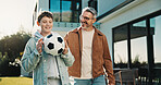 Soccer, smile and father with son outdoor for bonding, support or teaching game. Football, connection and weekend break with man and child in backyard of family home for growth, fun and care together