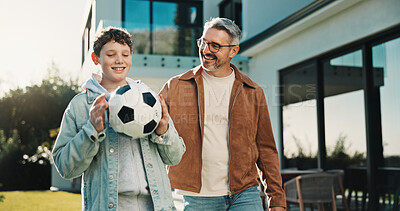 Buy stock photo Soccer, smile and father with son outdoor for bonding, support or teaching game. Football, connection and weekend break with man and child in backyard of family home for growth, fun and care together