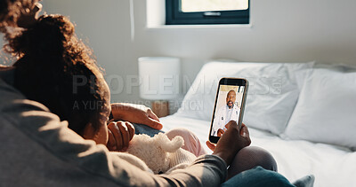 Buy stock photo Doctor, phone screen and telehealth with mother of child in home bedroom for medical consulting. App, healthcare and video call with family pediatrician on mobile for advice, feedback or support