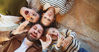 Buy stock photo Silly, parents or kids on floor with portrait, connection or happiness with family time. Above, playful or children in house with funny faces, solidarity or bonding together in healthy relationship.