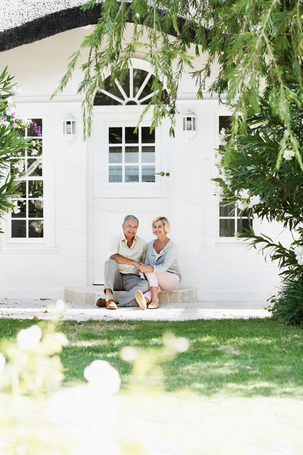 Buy stock photo Senior, couple and portrait outdoor by house for bonding, love and affection for relationship wellness in marriage. Woman, man and happy with smile and relax together in retirement in front yard