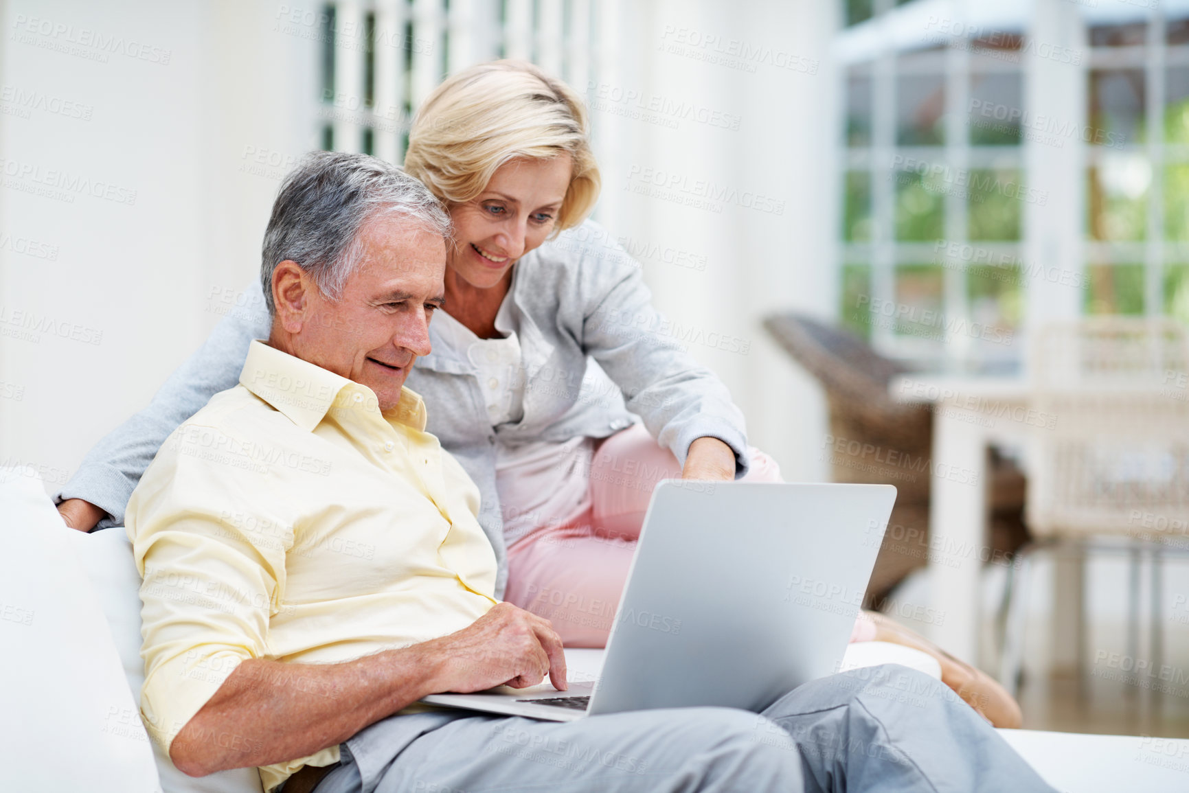 Buy stock photo Laptop, relax and search with old couple on sofa for retirement trip, bucket list destination or love. Travel itinerary, senior vacation or online with elderly man and woman in living room in home