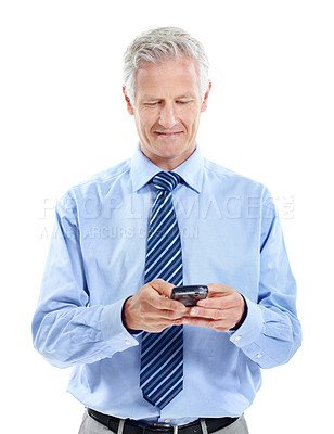 Buy stock photo Phone, typing and businessman in studio with texting, chatting or communication on mobile app. Tech, contact and mature corporate employee with cellphone for email for feedback on white background.