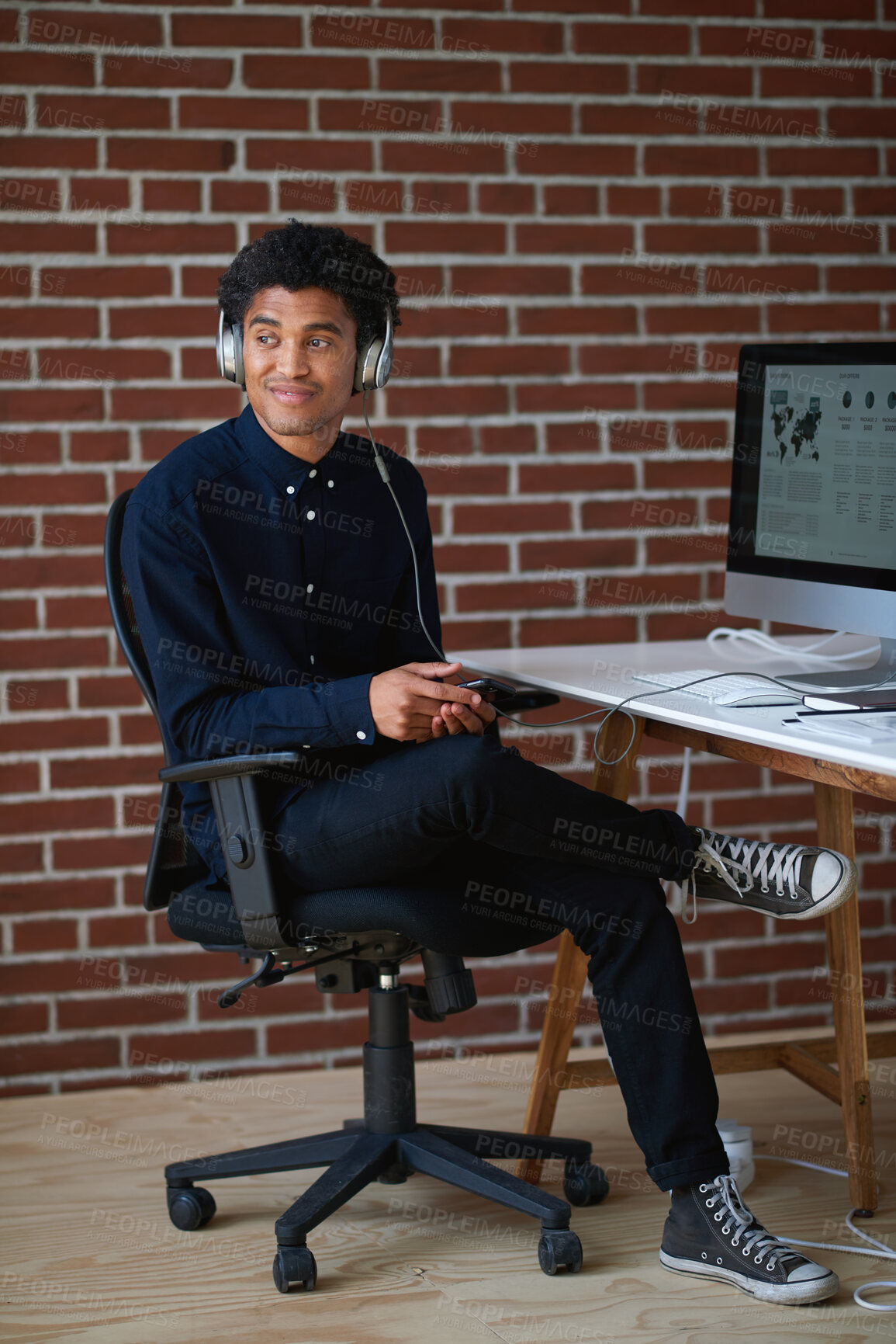 Buy stock photo Computer, man and thinking with headphones in office for audio transcription, sound or draft review. Listening, transcriber and tech for playback software, contemplating recording and podcast