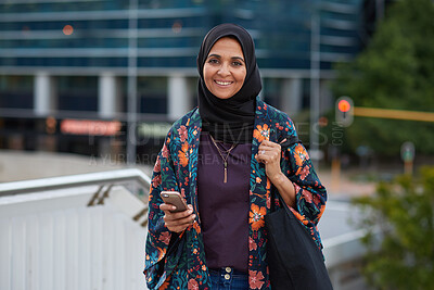 Buy stock photo Portrait, smile and Muslim woman in city with phone, bag and commute outdoor from creative agency. Happy, Islamic person and tech in urban town with confidence, pride and travel from advertising job.