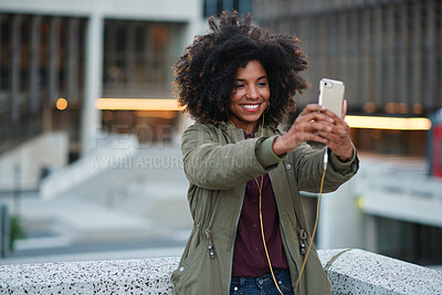 Buy stock photo Travel, photo and outdoor with black woman, phone to capture memory and sightseeing. Happiness, influencer or person with social media, post update and photography with live streaming in New York