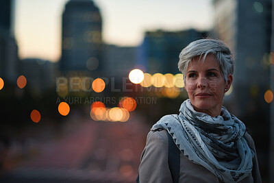 Buy stock photo Thinking, travel and woman in city at night with confidence for exploring on holiday, getaway or vacation. Bokeh, planning and mature female person with reflection in urban town on weekend trip.