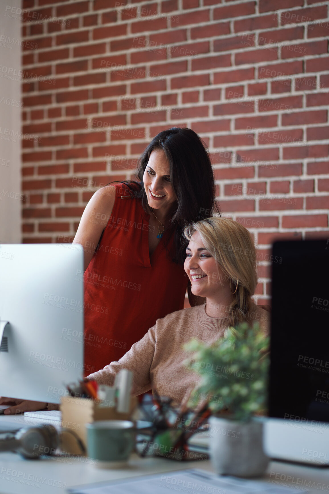 Buy stock photo Coaching, computer or business women in office for support, copywriting feedback or smile with intern. Mentor, tech and help new employee with article advice, training and learning with review