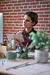 Business woman using computer in office brainstorming female entrepreneur thinking of creative ideas planning strategy looking pensive holding notebook