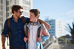 Young man embracing friend in city best friends bonding enjoying friendship