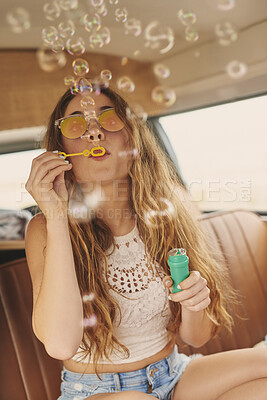 Buy stock photo Road trip, sunglasses and woman in caravan with bubbles fun on holiday, getaway or weekend break. Summer, adventure and female person with soap toy for drive in vehicle for travel on vacation.