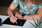 Young man using tablet computer student holding stylus pen on mobile touchscreen device