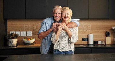 Buy stock photo Happy, hug and portrait of senior couple in kitchen at house with bonding, love and safety in relationship. Smile, commitment and elderly man embracing woman for connection in marriage in home.