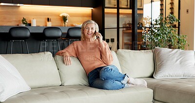 Buy stock photo Happy, phone call and woman on couch in lounge, relax and communication with contact and discussion. Mobile, chat and mature person with smile, chilling and listening to gossip or networking in house