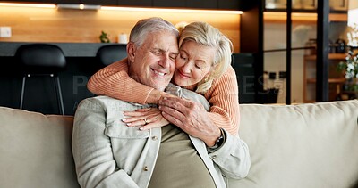 Buy stock photo Hug, home and senior couple with smile, laughing and connection with partner on break and affection. Happy, mature people and bonding on weekend, comfortable and commitment for relationship in house