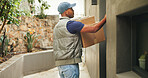 Knock, delivery and box with man at front door for logistics, courier service and package postage. Cargo, logistics and freight distribution with person at house doorway for supply chain parcel