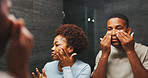 Skincare, black couple and love in bathroom with mirror, smile and facial treatment for hydration. Man, woman and reflection for dermatology with beauty, wellness or collagen with support in home