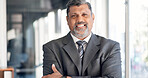 Portrait, businessman and lawyer in office with arms crossed, legal experience and pride for career. Happy, mature person and corporate attorney in firm with confidence, law compliance and about us.