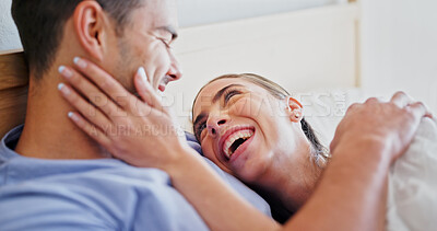 Buy stock photo Laughing, love and smile with couple in bedroom of home for bonding, support and connection. Trust, romantic partner and happiness with man and woman in bed in house for wellness, joke and loyalty 